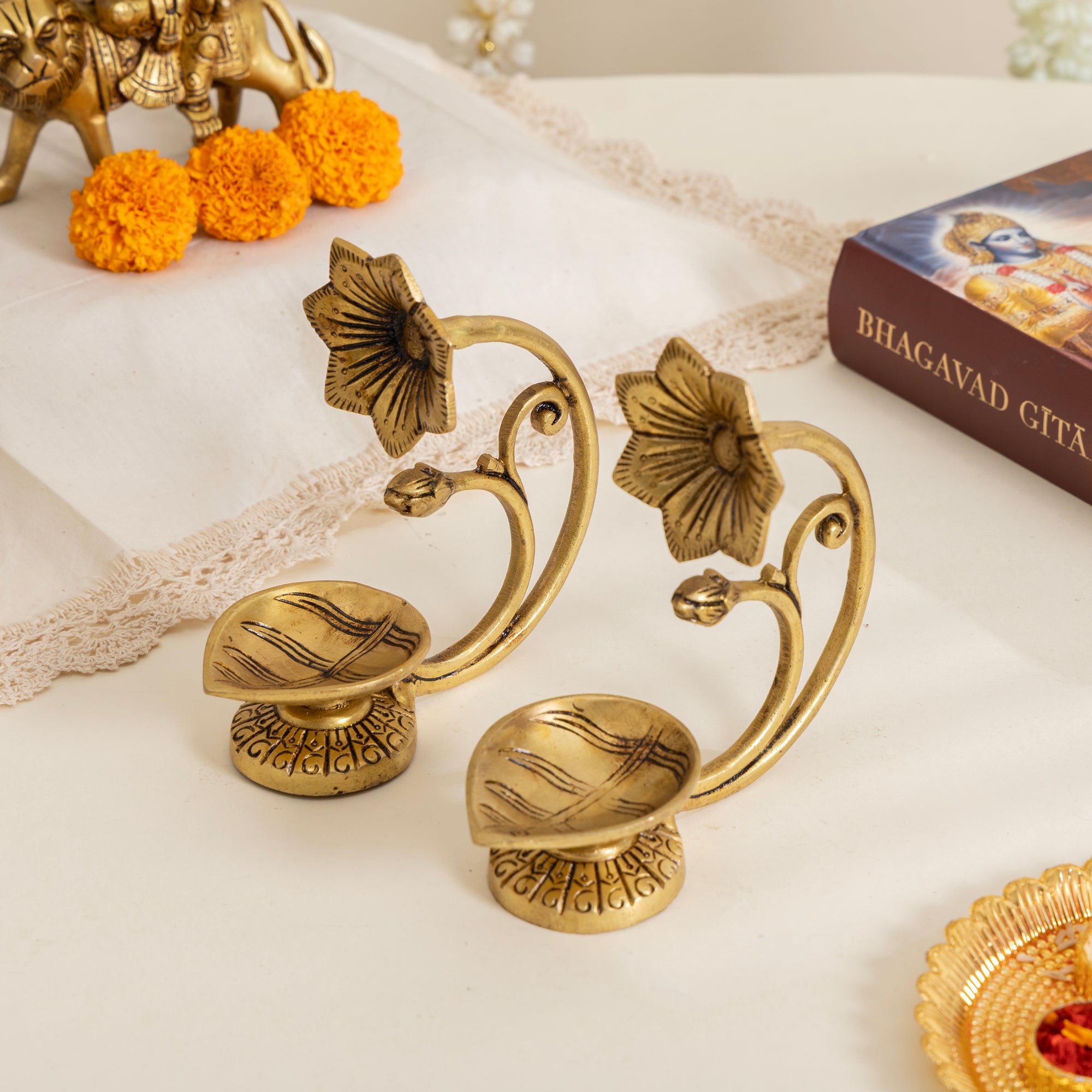 Handcrafted Pure Brass Diya with Flower Handle – Traditional Oil Lamp for Pooja & Decor Set of 2