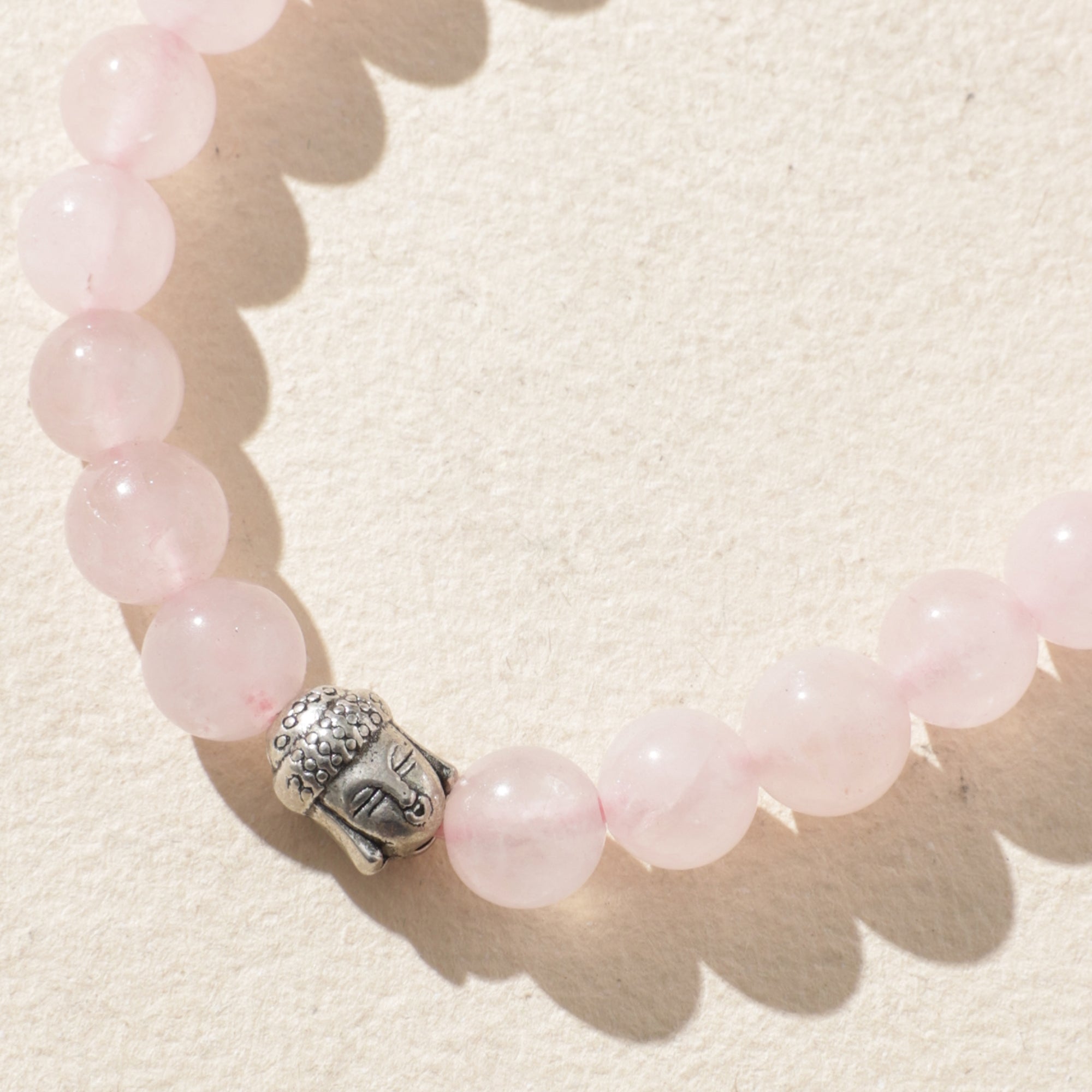 Certified Rose Quartz Crystal Bracelet with Buddha Head Charm