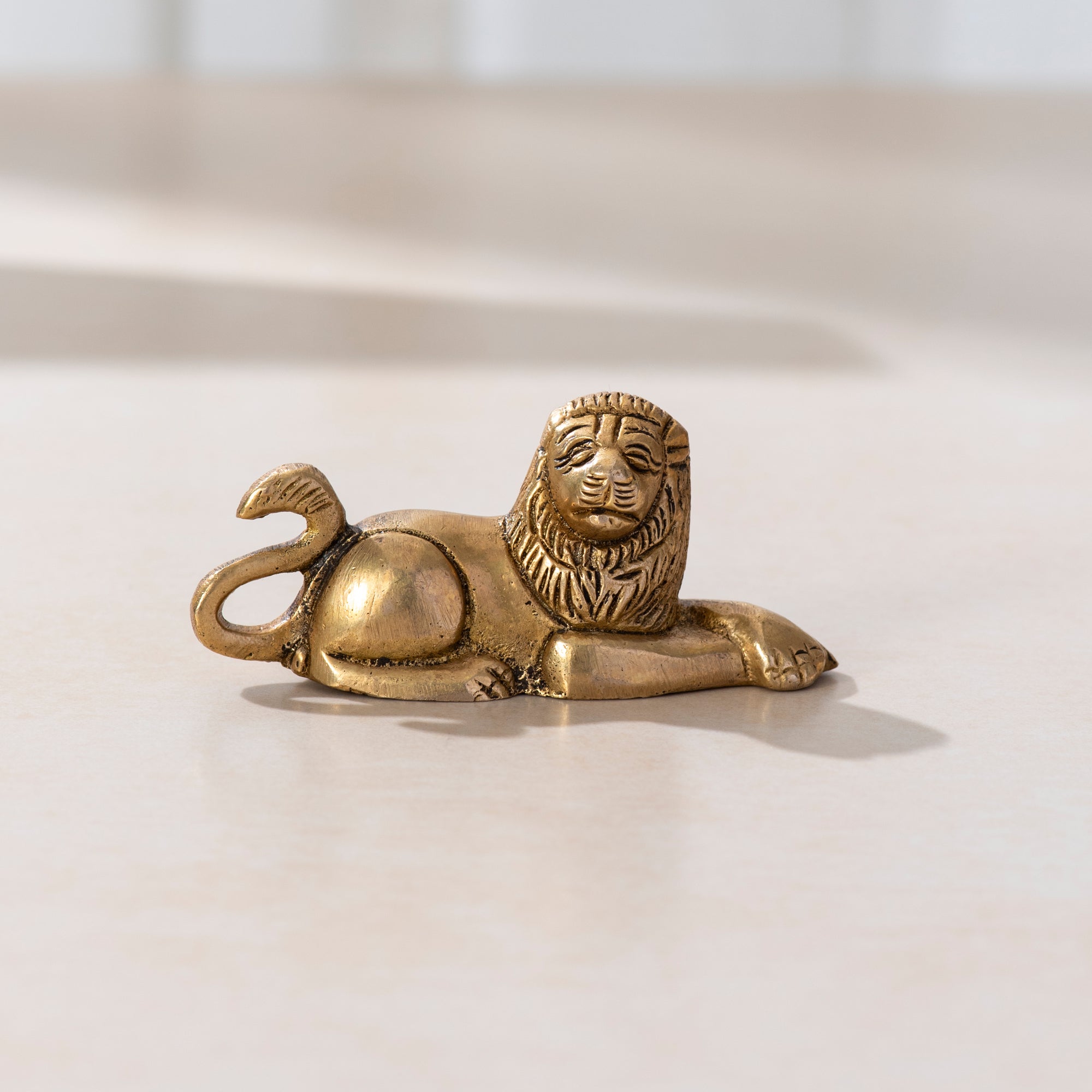 Brass Sitting Lion Pair - 3 inch