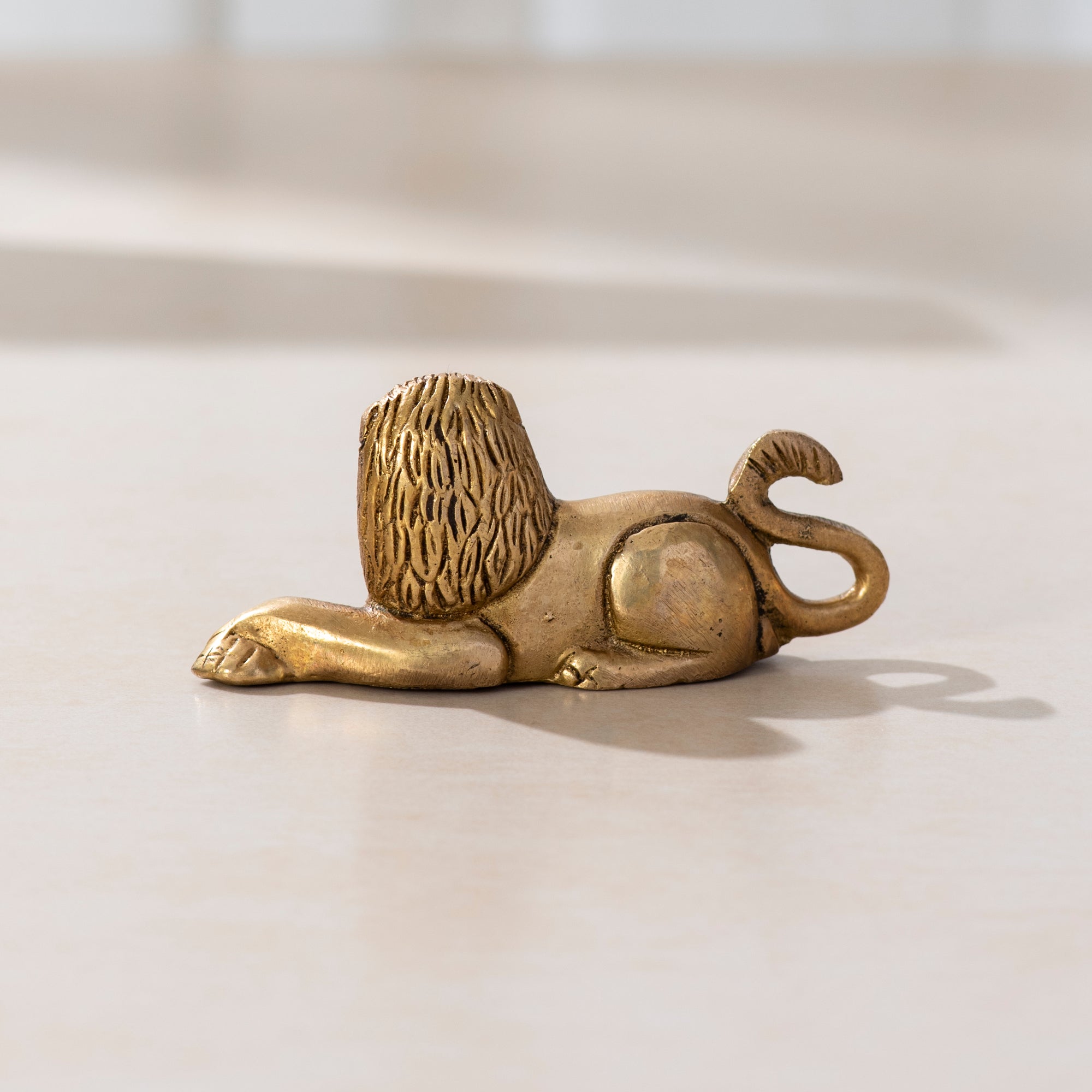 Brass Sitting Lion Pair - 3 inch