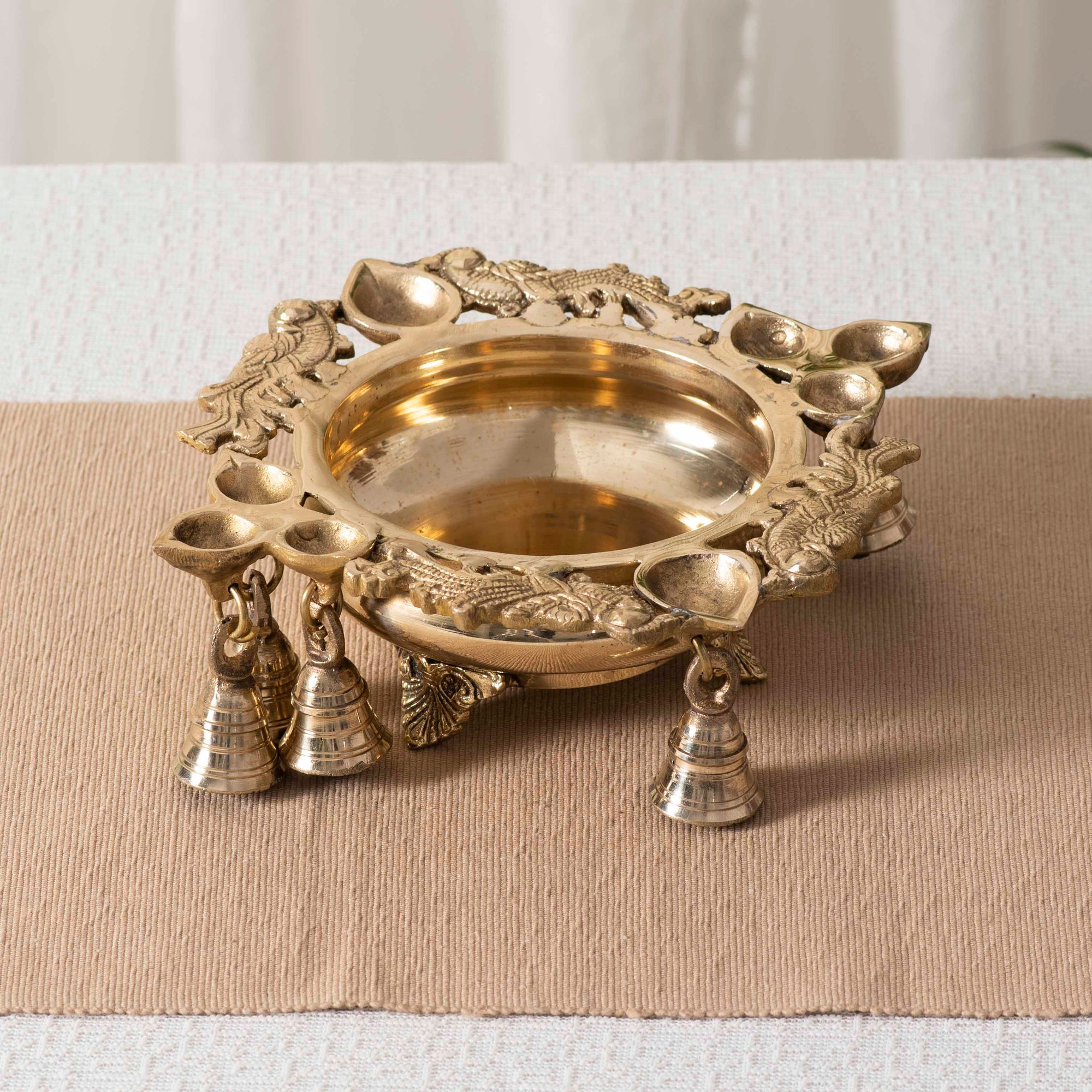 Brass Decorative Urli With Peacock and Bells - 8 Inch