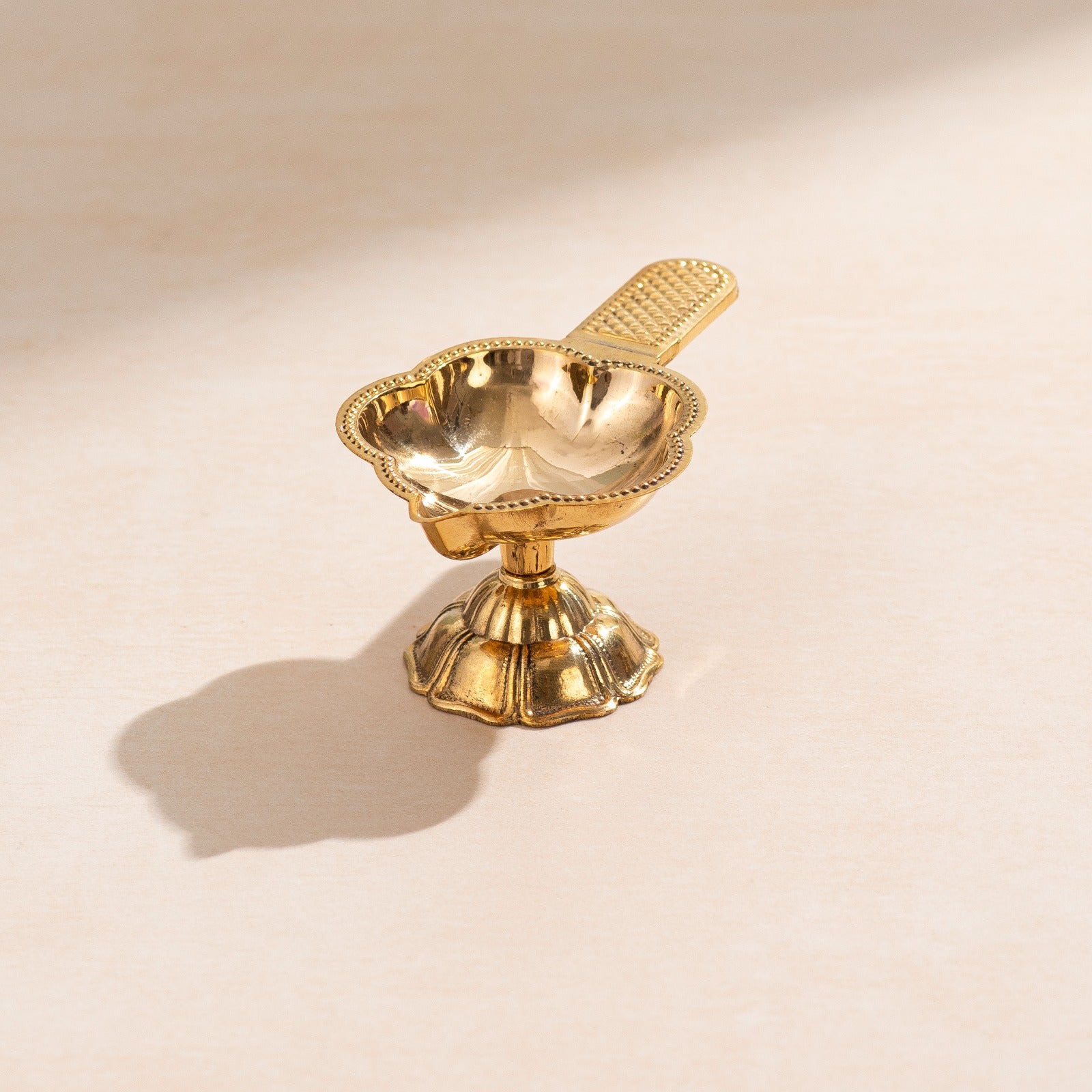 Brass Floral Kapur Aarti Diya with handle - 4 inch