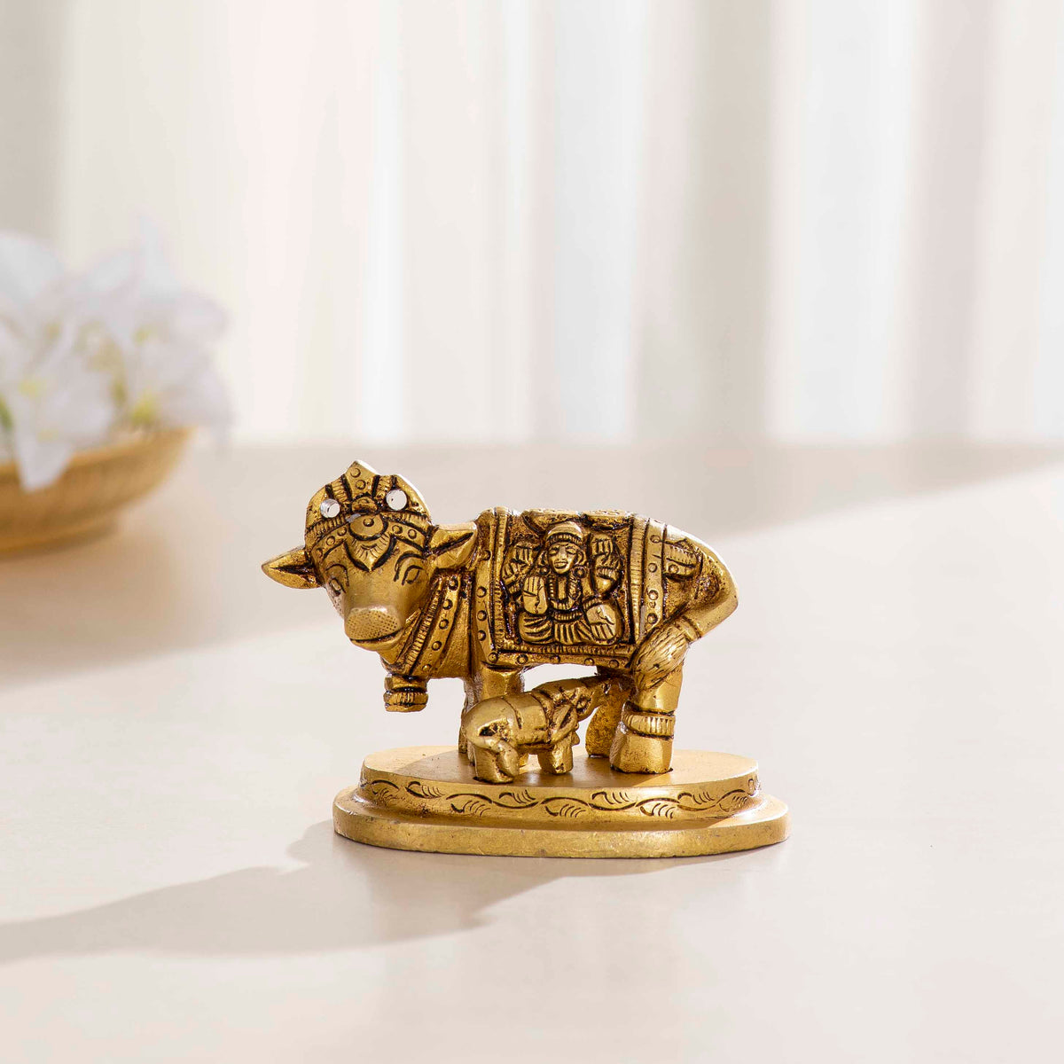 Brass Cow and Calf Idol with Ganesha and Lakshmi Engravings